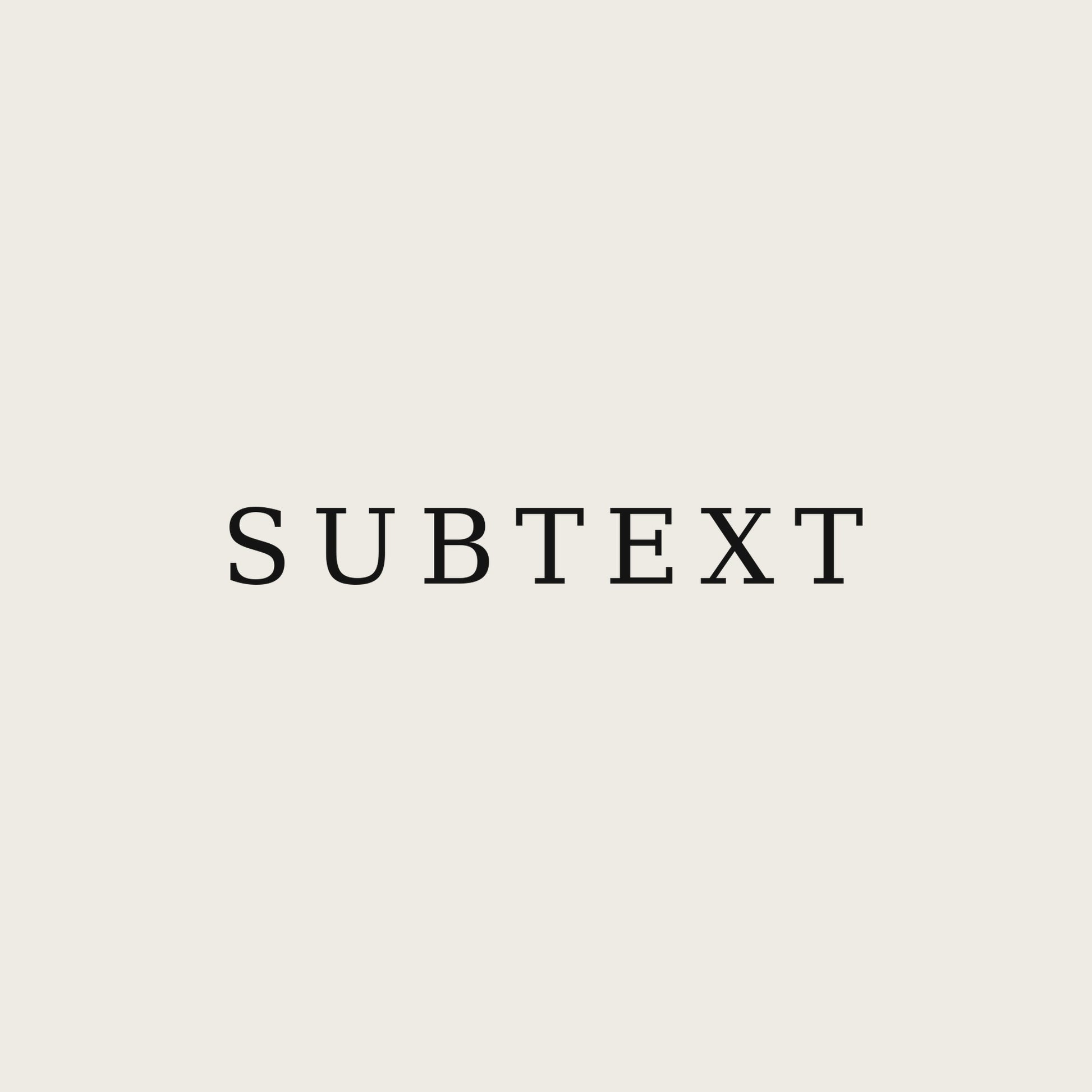 SUBTEXT — Premium Unisex Tee — print close-up